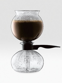 No other coffee maker has fascinated passionate coffee drinkers like the Pebo, thanks to an exceptional vacuum brewing method that extracts all the precious oils of your favorite coffee. The vacuum process is entirely sealed off so no aroma can escape, while the brewing times and temperatures are perfectly calibrated, ensuring a perfect cup of coffee with each brew. Monitor the eye-catching brewing process through the two firmly attached glass bowls! 6-cup/34-oz. No other coffee maker has fascinated passionate coffee drinkers like the Pebo, thanks to an exceptional vacuum brewing method that extracts all the precious oils of your favorite coffee. The vacuum process is entirely sealed off so no aroma can escape, while the brewing times and temperatures are perfectly calibrated, ensuring a perfect cup of coffee with each brew. Monitor the eye-catching brewing process through the two firmly attached glass bowls! 6-cup/34-oz.