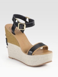 Grounded by a two-tone linen covered wedge, this classic design has adjustable leather straps and a rubber sole for traction. Linen-covered wedge, 5 (125mm)Linen-covered platform, 2 (50mm)Compares to a 3 heel (75mm)Leather and linen upperLeather liningRubber soleImported Grounded by a two-tone linen covered wedge, this classic design has adjustable leather straps and a rubber sole for traction. Linen-covered wedge, 5 (125mm)Linen-covered platform, 2 (50mm)Compares to a 3 heel (75mm)Leather and linen upperLeather liningRubber soleImported
