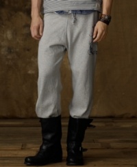 A nod to vintage athletic looks, these ultra-cozy, super-worn-in fleece sweatpants have an aged anchor stencil print for a look that is effortlessly cool. A nod to vintage athletic looks, these ultra-cozy, super-worn-in fleece sweatpants have an aged anchor stencil print for a look that is effortlessly cool.