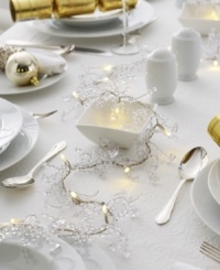 With vines of faceted red or sparkling clear beads, Rouge Living garland makes the holiday table. Tiny white lights give each bunch a festive glow that's also beautiful on a mantel or window sill. With vines of faceted red or sparkling clear beads, Rouge Living garland makes the holiday table. Tiny white lights give each bunch a festive glow that's also beautiful on a mantel or window sill.