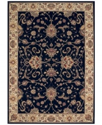 Evoking the strong look of ancient Sarouk rug designs, the Premier area rug from Dalyn is woven with intricate floral medallions in rich black. Made in Egypt of durable polypropylene and shimmering polyester fibers, it provides any room with captivating texture and added dimension. Evoking the strong look of ancient Sarouk rug designs, the Premier area rug from Dalyn is woven with intricate floral medallions in rich black. Made in Egypt of durable polypropylene and shimmering polyester fibers, it provides any room with captivating texture and added dimension.