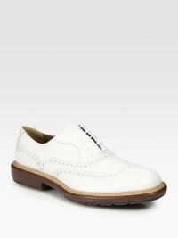 A weekend classic in burnished Italian calfskin, detailed with oxford perforations and a rugged lug sole.Leather liningPadded insoleRubber soleMade in Italy A weekend classic in burnished Italian calfskin, detailed with oxford perforations and a rugged lug sole.Leather liningPadded insoleRubber soleMade in Italy