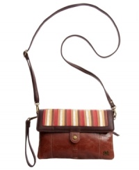 A true triple threat. This fabulous convertible design from The Sak can easily be worn as 3 different styles- crossbody, shoulder bag or clutch! A true triple threat. This fabulous convertible design from The Sak can easily be worn as 3 different styles- crossbody, shoulder bag or clutch!