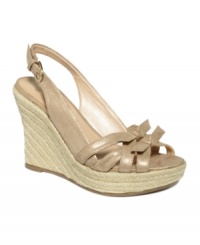 Your look is all tied up now. The Bowieo espadrille wedges by Marc Fisher are soft and luxe with a pair of dainty bows across the strappy vamp. Your look is all tied up now. The Bowieo espadrille wedges by Marc Fisher are soft and luxe with a pair of dainty bows across the strappy vamp.