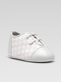 Lace-up style in soft cotton featuring allover mini GG print and leather trim.Cotton upper Lace-up closure Leather sole Made in Italy Additional InformationKid's Shoe Size Guide (European Equivalent) 