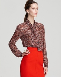 Infuse your 9-to-5 style with cool eclecticism in a vibrantly printed RAOUL blouse. Slip the sheer style into a crisp pencil skirt for modern polish. Infuse your 9-to-5 style with cool eclecticism in a vibrantly printed RAOUL blouse. Slip the sheer style into a crisp pencil skirt for modern polish.