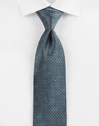 A savvy, sophisticated look woven in Italian silk, with a geometric pattern detail.SilkDry cleanMade in Italy