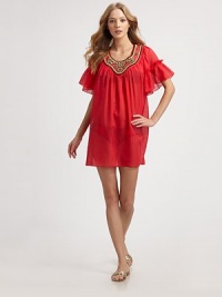 A bright, semi-sheer, beaded style with ruffled sleeves. Beaded scoopneckShort ruffles sleevesGathered front and back53% silk/47% cottonDry cleanMade in USA of imported fabricsAdditional Information Women's Premier Designer & Contemporary Size Guide A bright, semi-sheer, beaded style with ruffled sleeves. Beaded scoopneckShort ruffles sleevesGathered front and back53% silk/47% cottonDry cleanMade in USA of imported fabricsAdditional Information Women's Premier Designer & Contemporary Size Guide