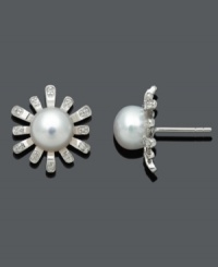 Give your style a growth spurt. These fantastic floral studs shimmer with a cultured freshwater pearl center (8-9 mm) and sparkle with the addition of round-cut diamond accents. Crafted in sterling silver. Approximate diameter: 5/8 inch.