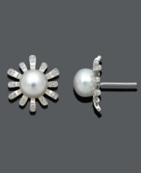 Give your style a growth spurt. These fantastic floral studs shimmer with a cultured freshwater pearl center (8-9 mm) and sparkle with the addition of round-cut diamond accents. Crafted in sterling silver. Approximate diameter: 5/8 inch. Give your style a growth spurt. These fantastic floral studs shimmer with a cultured freshwater pearl center (8-9 mm) and sparkle with the addition of round-cut diamond accents. Crafted in sterling silver. Approximate diameter: 5/8 inch.