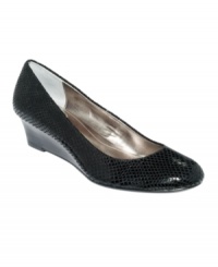 Calvin Klein's Saxton wedge pumps are polished and pretty with just the right amount of texture and height.