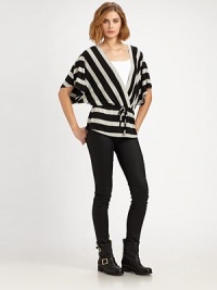 Striped crossover v-neck with three-quarter dolman sleeves and an adjustable drawstring waistband. Crossover v-neckThree-quarter dolman sleevesDropped shouldersDrawstring waistbandV-back96% rayon/4% spandexHand washMade in USAModel shown is 5'10½ (179cm) wearing US size 4. Striped crossover v-neck with three-quarter dolman sleeves and an adjustable drawstring waistband. Crossover v-neckThree-quarter dolman sleevesDropped shouldersDrawstring waistbandV-back96% rayon/4% spandexHand washMade in USAModel shown is 5'10½ (179cm) wearing US size 4.