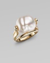 The creamy luster and organic shape of a baroque pearl is the centerpiece of a ring of polished 18k gold vermeil. 16mm baroque white organic man-made pearl 18k gold vermeil Made in Spain