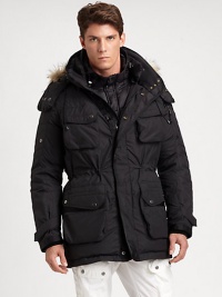 The Iditarod parka, an essential water-resistant and -repellent design for the colder months, features a multitude of pockets and an attached hood with faux-fur trim for a truly utilitarian feel.Zip frontSnap-button placketDetachable drawstring hoodDetachable faux-fur trimChest, hip flap pocketsFully linedAbout 30 from shoulder to hemPolyesterMachine washImported The Iditarod parka, an essential water-resistant and -repellent design for the colder months, features a multitude of pockets and an attached hood with faux-fur trim for a truly utilitarian feel.Zip frontSnap-button placketDetachable drawstring hoodDetachable faux-fur trimChest, hip flap pocketsFully linedAbout 30 from shoulder to hemPolyesterMachine washImported