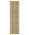 With a soft, aqua-blue center, bordered in light beige, this Nourison area rug offers a fluid color palette style for any space. Rivaling the world's finest heirloom rugs, this handcrafted piece is made with a luxuriously dense New Zealand wool pile and woven with generous portions of pure silk.