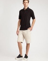 EXCLUSIVELY OURS. A must-have slim-fitting silhouette of lightweight cotton. Two-button placketShort sleeves,/li> CottonMachine washImported