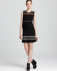 Fringe lends flair to this zig-zag knit Nanette Lepore dress with cinched drawstring waist. Fringe lends flair to this zig-zag knit Nanette Lepore dress with cinched drawstring waist.