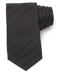 Perfect for a night on the town, this handsome stripe tie is crafted in super-soft Italian silk for just the right touch. Perfect for a night on the town, this handsome stripe tie is crafted in super-soft Italian silk for just the right touch.