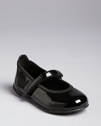 She'll shine on when she wears these faux patent leather ballerina flats. With a small heel and a velcro strap, they're comfortable, and they'll stay on her feet. She'll shine on when she wears these faux patent leather ballerina flats. With a small heel and a velcro strap, they're comfortable, and they'll stay on her feet.