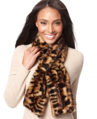 Enliven your winter wardrobe with Calvin Klein's leopard-print pull-through scarf! It's a perennially chic pattern you'll wear well beyond this season. Enliven your winter wardrobe with Calvin Klein's leopard-print pull-through scarf! It's a perennially chic pattern you'll wear well beyond this season.