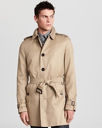 A single breasted silhouette lends a clean, timeless look to a classic Burberry trench. A single breasted silhouette lends a clean, timeless look to a classic Burberry trench.