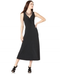 Create a look of easy-going chic in Ellen Tracy's day-to-night maxi dress. A front knot design adds an interesting twist. Create a look of easy-going chic in Ellen Tracy's day-to-night maxi dress. A front knot design adds an interesting twist.