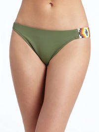 THE LOOKBeading at left hipElastic waist and leg openingsFull rear coverageTHE MATERIAL80% nylon/20% spandexFully linedCARE & ORIGINHand washMade in USAPlease note: Bikini top sold separately. THE LOOKBeading at left hipElastic waist and leg openingsFull rear coverageTHE MATERIAL80% nylon/20% spandexFully linedCARE & ORIGINHand washMade in USAPlease note: Bikini top sold separately.