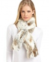 THE LOOKLush pieced rabbit furPull-through slit for easy on and offLuxe wool/cashmere liningTHE FIT5W X 46LTHE MATERIALNatural rabbit furWool/cashmere liningCARE & ORIGINDry clean by fur specialistImportedFur origin: China