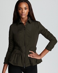 Update your outerwear with this flattering Burberry London jacket sporting a peplum waist for feminine flair. Update your outerwear with this flattering Burberry London jacket sporting a peplum waist for feminine flair.