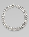 From the Cordelia Collection. Polished sterling silver in an undulating curb chain design.Sterling silver Length, about 18¾ Width, about 18mm Toggle closure Imported 