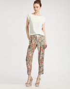 Classic trousers get a touch of feminine chic in printed silk with a hint of stretch.Wide waistband with belt loopsFront zip with hook-and-bar closureInverted pleatsSide slash pocketsBack slash pocketsCuffed legsRise, about 10Inseam, about 2995% silk/5% spandexDry cleanImportedModel shown is 5'10 (177cm) wearing US size 4.