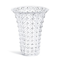 Exclusive to Bloomingdale's, this dimensional vase from Lalique is hand crafted of sparkling crystal in a repeating clover pattern adapted from Venetian architecture.