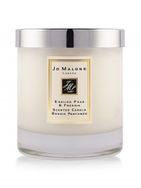 Experience the surprising, sensuous freshness of sweet pears, wrapped in a bouquet of white freesias, on a subtle background of scrambling wild roses an skin-warming amber, pathouli and woods. English Pear & Freesia Home Candle envelops a room and lingers for hours to create an ambience that is fresh and unexpected. Candle burn time is 45 hours. Lid included. Experience the surprising, sensuous freshness of sweet pears, wrapped in a bouquet of white freesias, on a subtle background of scrambling wild roses an skin-warming amber, pathouli and woods. English Pear & Freesia Home Candle envelops a room and lingers for hours to create an ambience that is fresh and unexpected. Candle burn time is 45 hours. Lid included.