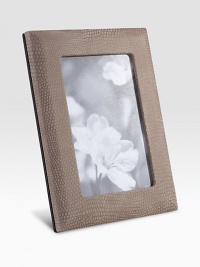 Display your memories in this handmade frame, wrapped in viper-printed nubuck leather with sturdy metal easel and convenient rear drop-down door for easy access.LeatherMade in USA DIMENSION INFORMATION 4 X 65 X 7 Display your memories in this handmade frame, wrapped in viper-printed nubuck leather with sturdy metal easel and convenient rear drop-down door for easy access.LeatherMade in USA DIMENSION INFORMATION 4 X 65 X 7