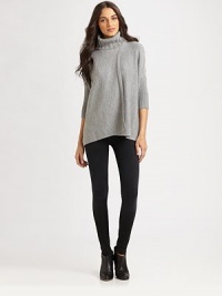 A contemporary take on the timeless turtleneck, this lengthy wool and cashmere sweater has overlapping panels and exaggerated dolman sleeves. Ribbed turtleneckThree-quarter dolman sleevesRibbed cuffsOverlapping panelsAbout 28 from shoulder to hem90% wool/10% cashmereDry cleanImportedModel shown is 5'9 (176cm) wearing US size X-Small/Small.OUR FIT MODEL RECOMMENDS ordering one size down as this style runs large. A contemporary take on the timeless turtleneck, this lengthy wool and cashmere sweater has overlapping panels and exaggerated dolman sleeves. Ribbed turtleneckThree-quarter dolman sleevesRibbed cuffsOverlapping panelsAbout 28 from shoulder to hem90% wool/10% cashmereDry cleanImportedModel shown is 5'9 (176cm) wearing US size X-Small/Small.OUR FIT MODEL RECOMMENDS ordering one size down as this style runs large.