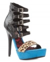 Straps galore and a sexy lace sock make Two Lips' Laquer platform sandals truly unique. The leopard print pony hair toe strap totally pops against the brightly colored platform.