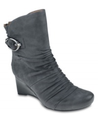 Fall in love with the ruching on the vamp of the Chelsea wedge booties. With a cupped heel, an anatomical arch, and a cradled toe area for toe support, this is sure to be one of the most foot-friendly pairs you own. Fall in love with the ruching on the vamp of the Chelsea wedge booties. With a cupped heel, an anatomical arch, and a cradled toe area for toe support, this is sure to be one of the most foot-friendly pairs you own.