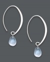 Subtly stunning. Polished hoop earrings receive an added hint of color with a shimmering aquamarine drop (3 ct. t.w.). Open hoop setting crafted in sterling silver. Approximate drop: 1-1/2 inches.