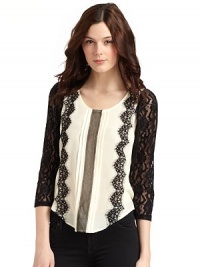 THE LOOKRound necklinePullover styleLong lace sleevesLace detailsPleated front with mesh detailTHE FITAbout 22 from shoulder to hemTHE MATERIALSilkCARE & ORIGINDry clean ImportedModel shown is 5'9½ (176cm) wearing US size 4. 