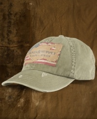 An homage to an American pastime, this baseball cap is rendered in distressed cotton twill with a ripped and repaired logo patch for a worn-in, old-school vibe. An homage to an American pastime, this baseball cap is rendered in distressed cotton twill with a ripped and repaired logo patch for a worn-in, old-school vibe.