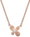 Feminine blossoms adorn this darling mini pendant by CRISLU. Crafted in 18k rose gold over sterling silver with faceted cubic zirconia (1/10 ct. t.w.). Approximate length: 16 inches + 2-inch extender. Approximate drop: 1/4 inch.