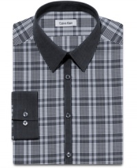 A crisp plaid and a contrast collar gives this slim-fit shirt from Calvin Klein instant presence from the boardroom to the break room. A crisp plaid and a contrast collar gives this slim-fit shirt from Calvin Klein instant presence from the boardroom to the break room.