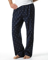 Woven cotton pajama pants with button fly and drawstring and elastic waist. Woven patch on front waistband. All over printed pony players. Woven cotton pajama pants with button fly and drawstring and elastic waist. Woven patch on front waistband. All over printed pony players.