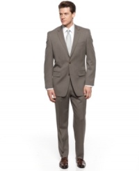 From the interview to the sales call to the corner office, this olive tonal stripe suit from Michael Kors is an easy, versatile choice. From the interview to the sales call to the corner office, this olive tonal stripe suit from Michael Kors is an easy, versatile choice.