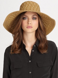 This dramatic, packable straw topper features signature logo rivets, elasticized inner band and an oversized, sloped brim for maximum sun protection and style.Brim, about 4.75Elasticized inner band fits most95% UVA/UVB protectionPolypropylene/polyesterSpot cleanImported and hand-finished in the USA