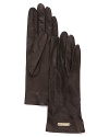 Chic lambskin gloves with perforated thumb and index fingers for easy phone dialing on those chilly nights.