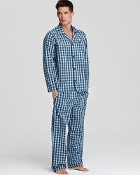 Get a restful night's sleep in these crisp cotton pajamas, cool against the skin for relaxed comfort.