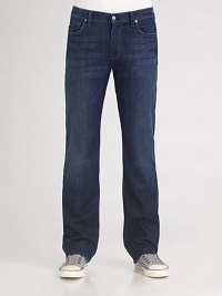 The standard against all other jeans will be measured in dark-washed denim with a relaxed fit and straight legs. Distressed edges and slight fading add a coveted worn-in look. Five-pocket design Sits higher on the waist Embroidered design on the back pockets Inseam, about 33 inseam Cotton/spandex; machine wash Imported