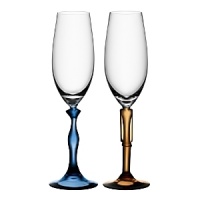 The Two Of Us champagne glasses are a tribute to everlasting love and the joy of finding that person who will always stand by you. Designed by Kjell Engman for Kosta Boda. The Two Of Us champagne glasses are a tribute to everlasting love and the joy of finding that person who will always stand by you. Designed by Kjell Engman for Kosta Boda.