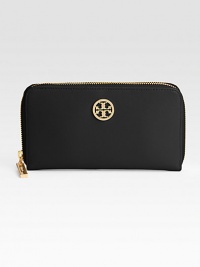 Subtly textured leather in a trim zip-around style with a bold logo medallion.Zip around closure One inside center zip pocket 8 inside card slots Leather lining 7½W X 4H X ½D Imported Subtly textured leather in a trim zip-around style with a bold logo medallion.Zip around closure One inside center zip pocket 8 inside card slots Leather lining 7½W X 4H X ½D Imported